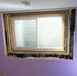 Completed basement egress window enlargement and replacement.