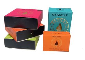 Carton tray with carton sleeve soft touch lamination