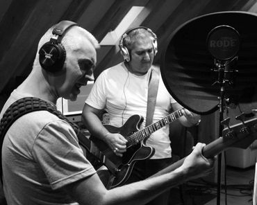 Taj and Gerard playing in the studio