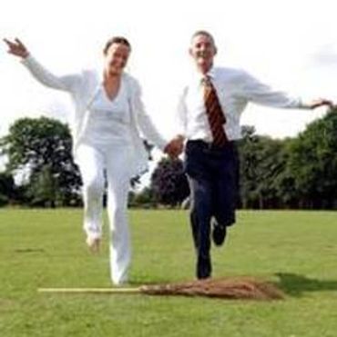 Jumping the Broom after a handfasting / wedding ceremony