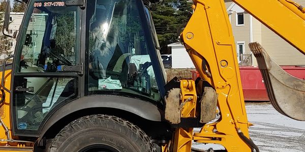 Carl Emond excavation déneigement location de conteneur produit en vrac et tamisage mobile 