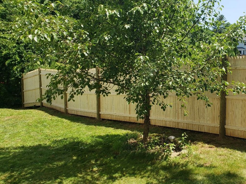 6' high Spruce stockade with pressure round pressure treated post.