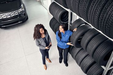 Large racks of new tires