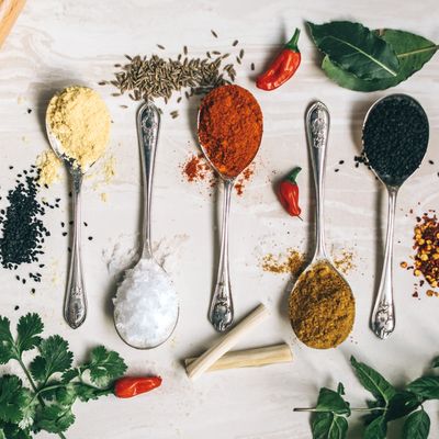 spoons spices herbs parsley bay paprika salt