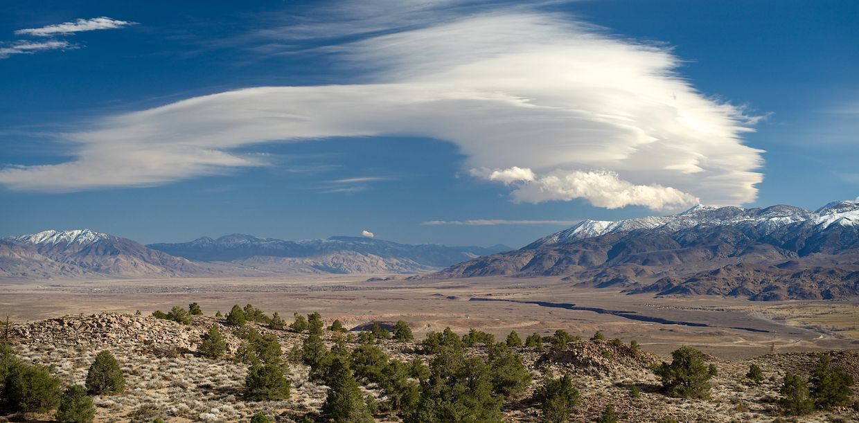 Sierra Wave: stacked lenticular over rotor cloud.  Photo taken near Bishop looking south, with Sierr