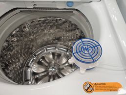 washer fan on edge of top load washer