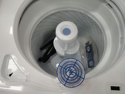washer fan mounted to top load washer