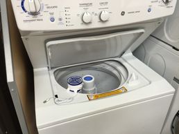 washer fan mounted on stacked washer unit