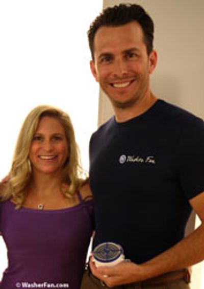 Couple holding a Washer Fan