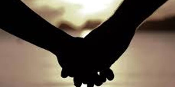 Our Lady of Compassion Ministerial services officiating Weddings Commitment Ceremonies holding hands