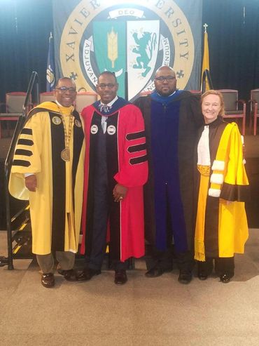 Dr. Sewell, President Verret, Dr. Brian Turner, and  Provost McCall,  after Sewell's address.
