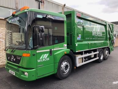 Wilrose dustcart in Sutton front of dustcart and side.
