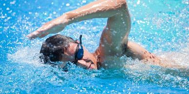 The Swim Center instructor teaches stroke development in McDonough GA Henry county best swim lessons