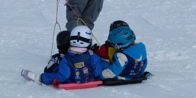 kids on toboggan