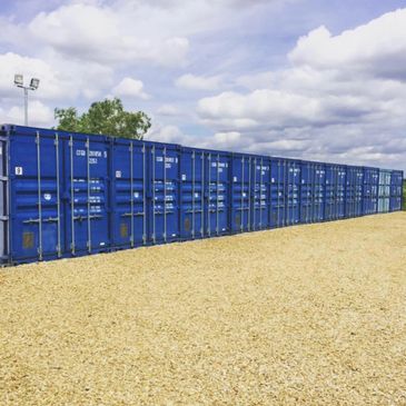 Self storage containers in a yard