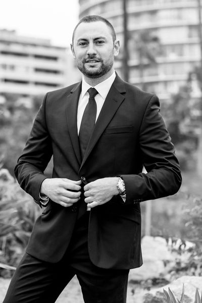 Property manager standing in front of Downtown Tower