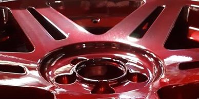 Red painted alloy wheel