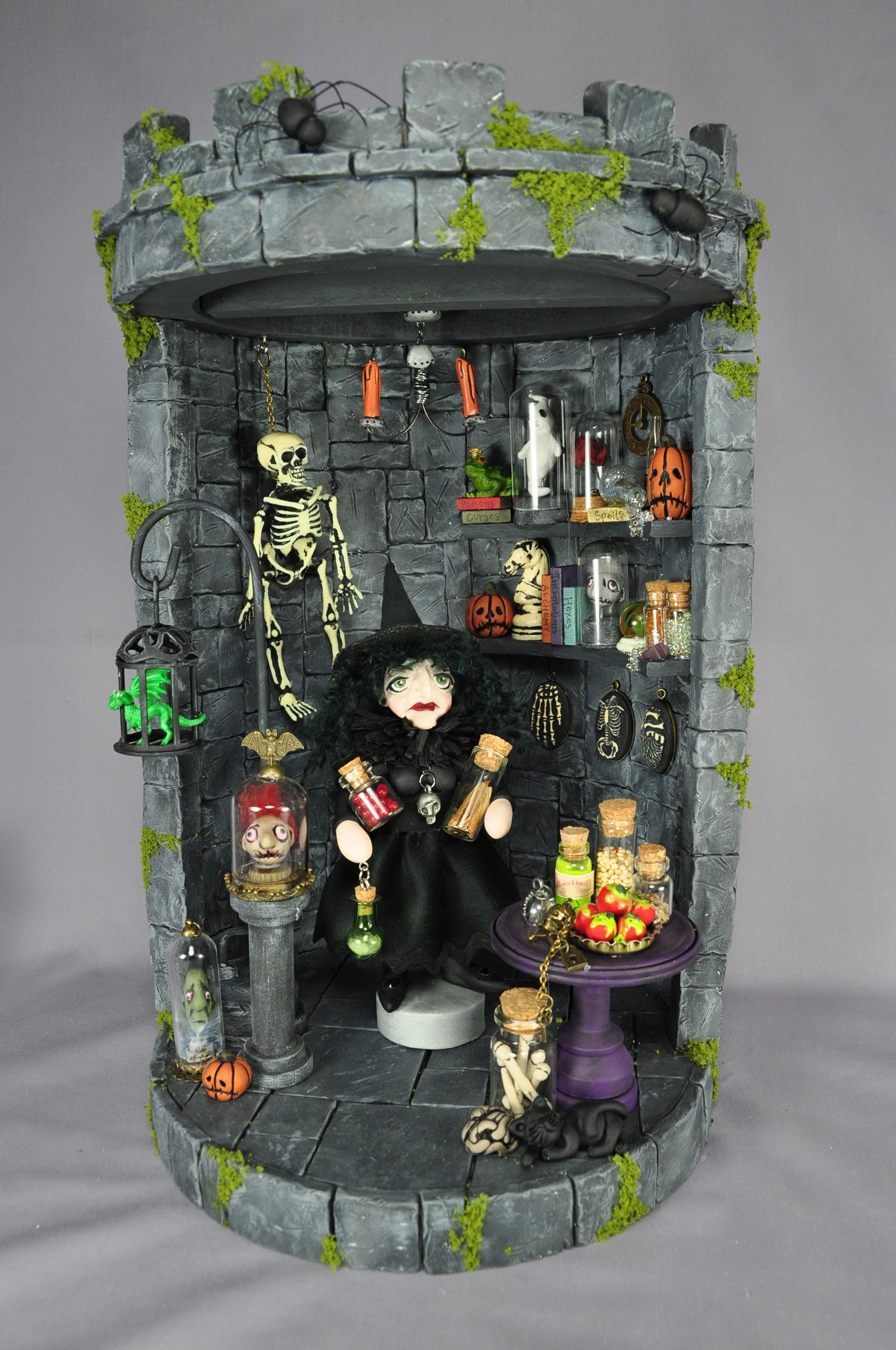 Intricately detailed mixed-media castle shadow box vignette with wicked witch polymer clay art doll