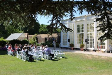 guests in front of langtons Orangery on the lawn