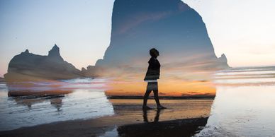 jen is double exposed using haystack rock in oregon as a background