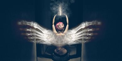 Jen poses for a self-portrait using foot X-rays as wings