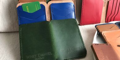 Men's Leather Wallets made with 4 card slots and 2 slots for bills. Made in Raleigh, NC.