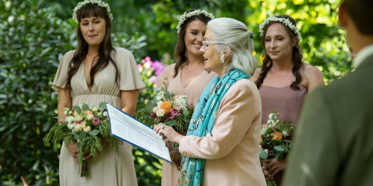 Alison Moore and other wedding visitors in a wedding ceremony
