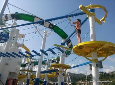 Cruise ship passenger on aerial adventure park.