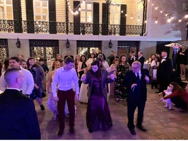 DJ Scott Garrison leading a line dance