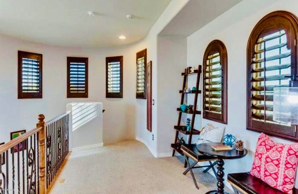 Upper-level walkway in listing in Gilbert, AZ.