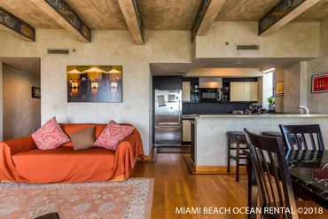 mamibeachoceanrental r5f living room kitchenette