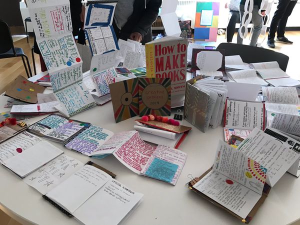 At the end of the 3-week creative process course, students design & present a gallery of learning.