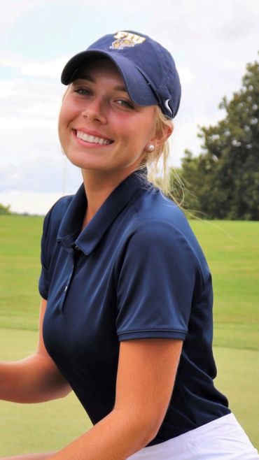 Junior Girl Golfer smiling