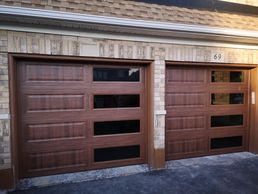wood grain garage doors with tinted windows on the side