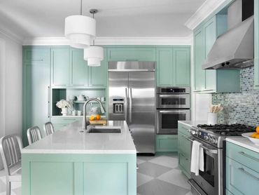 Painted teal kitchen cabinets