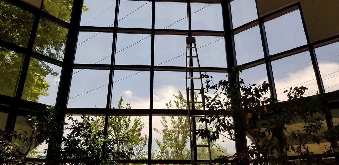 A clean window in a house with large windows.