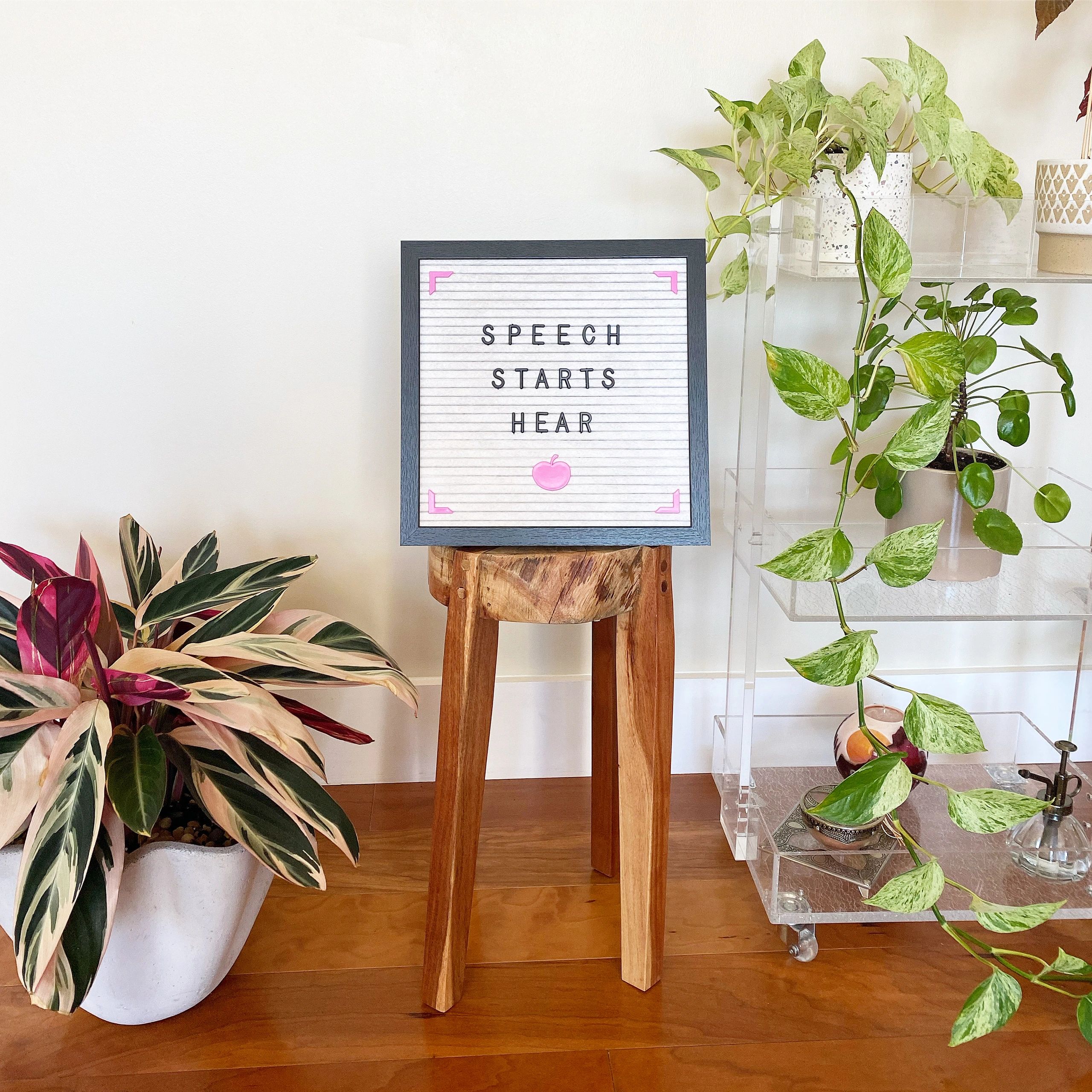 Speech Starts Hear office sign