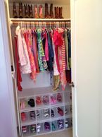 Visually appealing, functional, shared childrens' closet for 2 kids