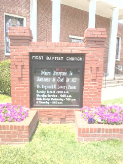 Brick marquee showing First Baptist Church.