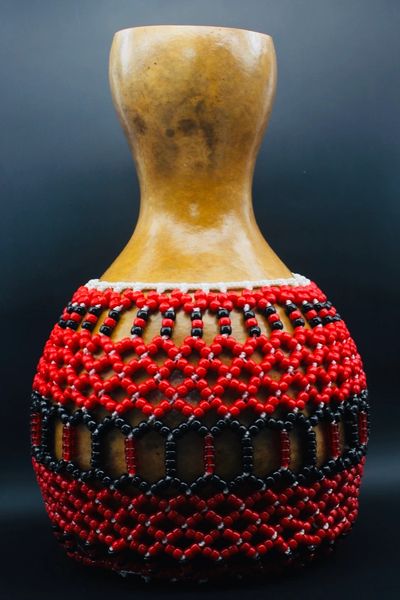 Large Red and Black Shekere, Beaded in guiro style.