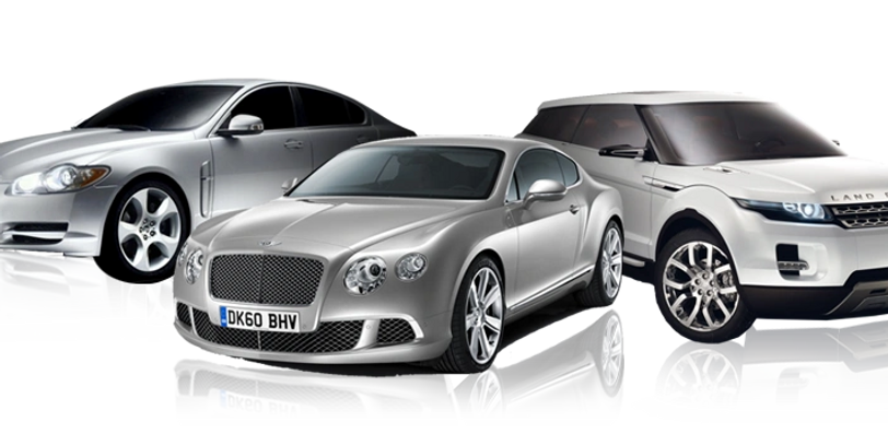 Three Silver Color Cars Placed Side by Side