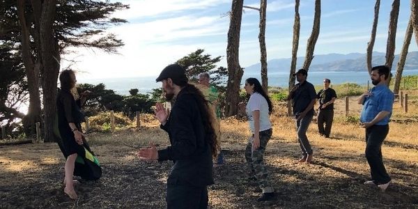 Qi gong next to the ocean.