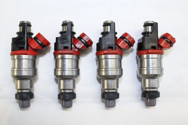 Injectors Set Of 4 Toyota 22RE 22RTE OEM Denso Reman Injectors