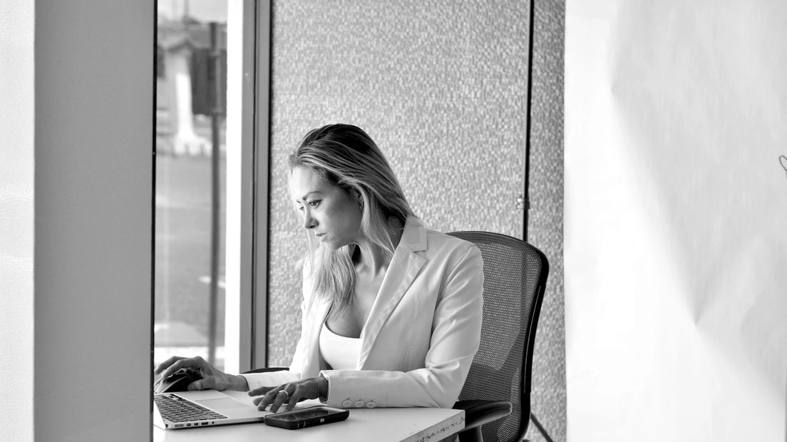 Lady coworking in office space at Cosmos