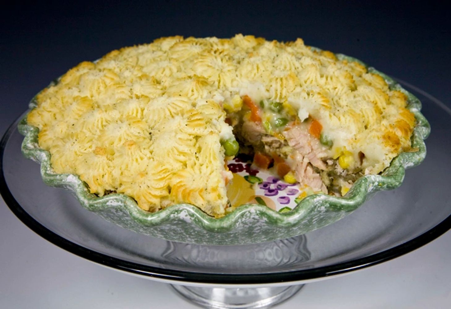 Chicken Dinner Pie - Featured this week. Stuffing, chicken, mixed veggies, gravy, mashed potatoes.