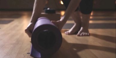 Rolling up a yoga mat