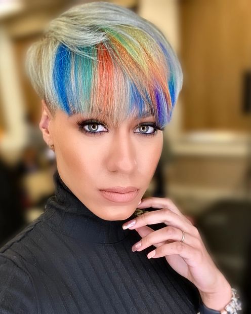a woman with colorful hair