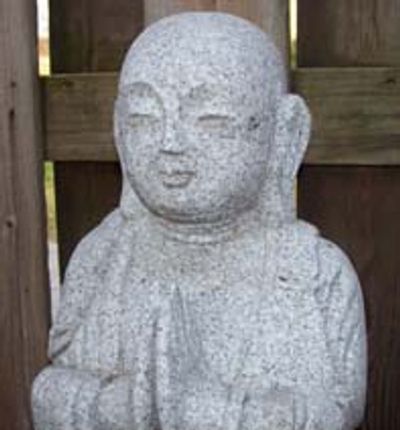 Jizo Bodhisattva statue sits outside of the Atlanta Dojo.