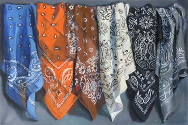 Six bandanas in a row. Blue, orange, brown, white, black and grey.