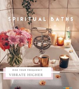 The crystal shops also offer spiritual baths. bath tub with water flowers herbs candle tea mug. 